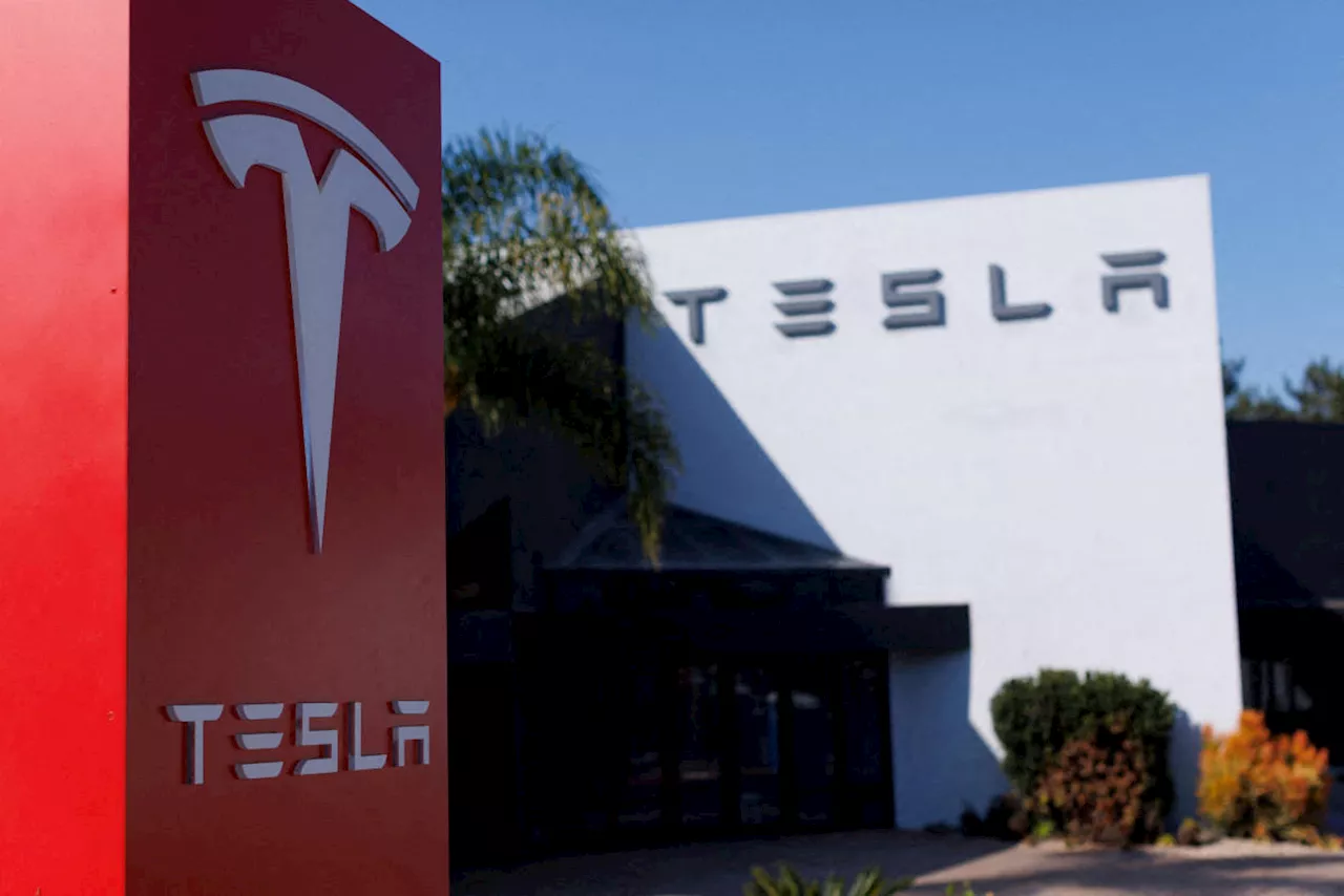 Tesla stock closes below $200, hits 5-month low as a tough October rolls on