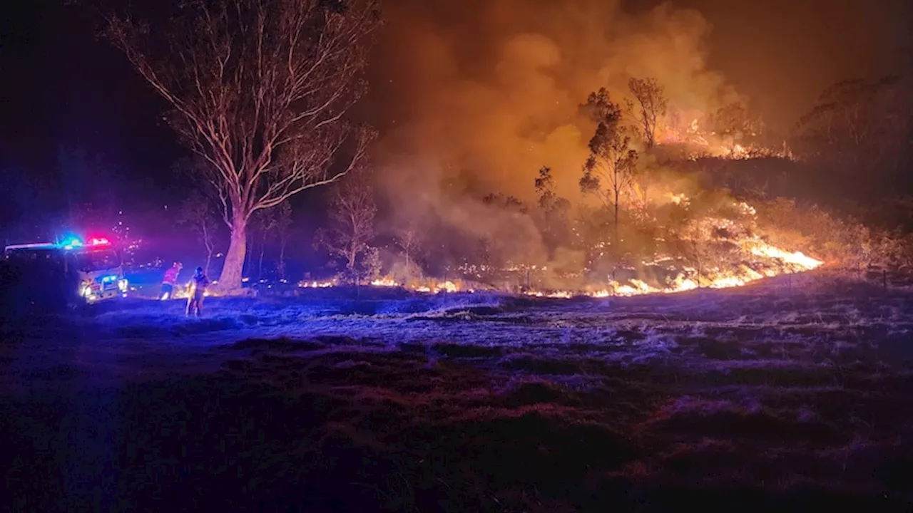 Easing weather conditions help firefighters control raging fires in Queensland and New South Wales