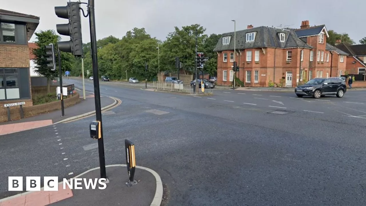 Camberley: Road closed after man found seriously injured