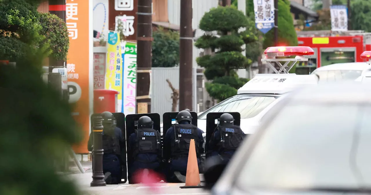 Suspected gunman in Japan takes hostages in a post office