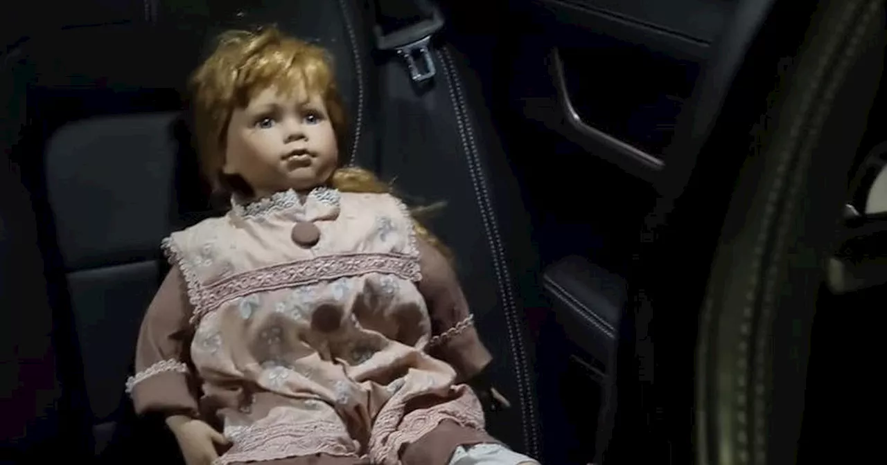 'Haunted doll' knocks on boot of woman's car and uses glass to 'communicate'