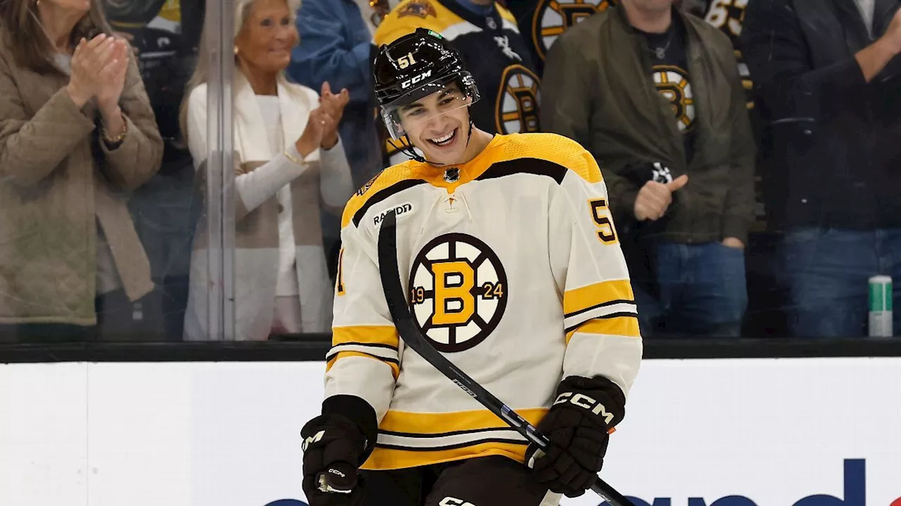  Rookie Matt Poitras stays with Bruins