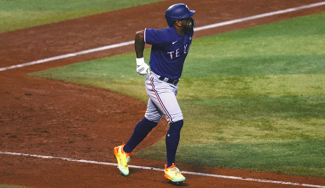 Rangers slugger Adolis García appears to hurt left side, leaves World Series Game 3