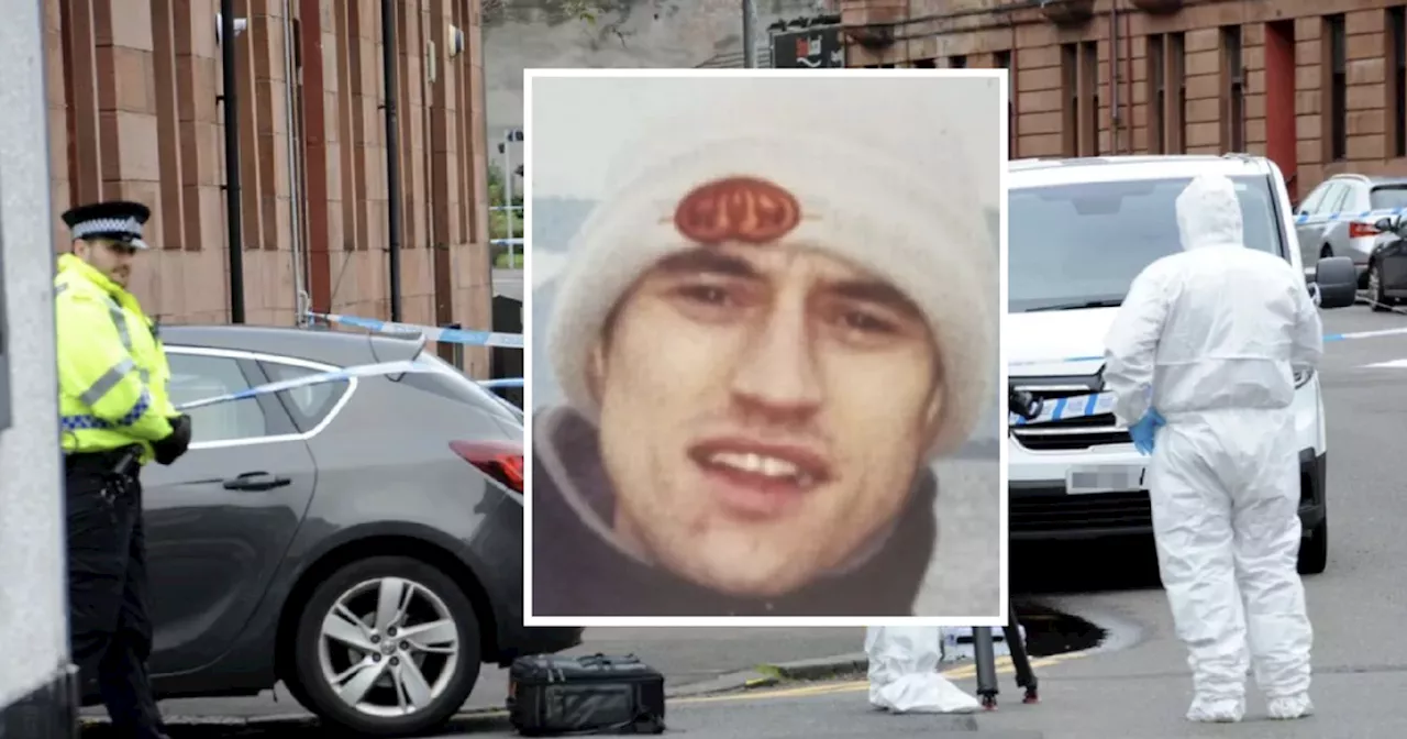 Tributes to 'gentle giant' found dead on Renfrew street as man arrested