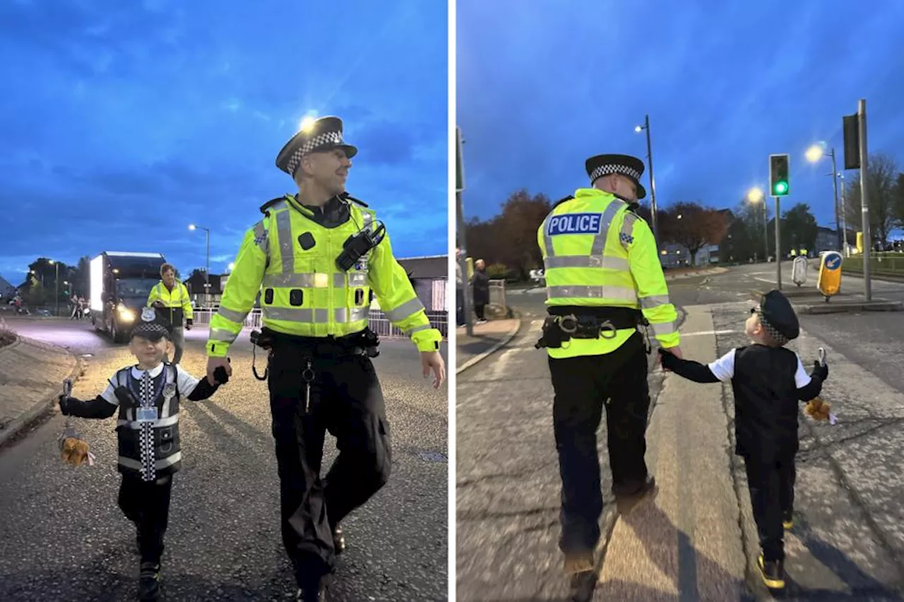 Kind-hearted Cop Makes Youngster's Dreams Come True at Halloween Parade