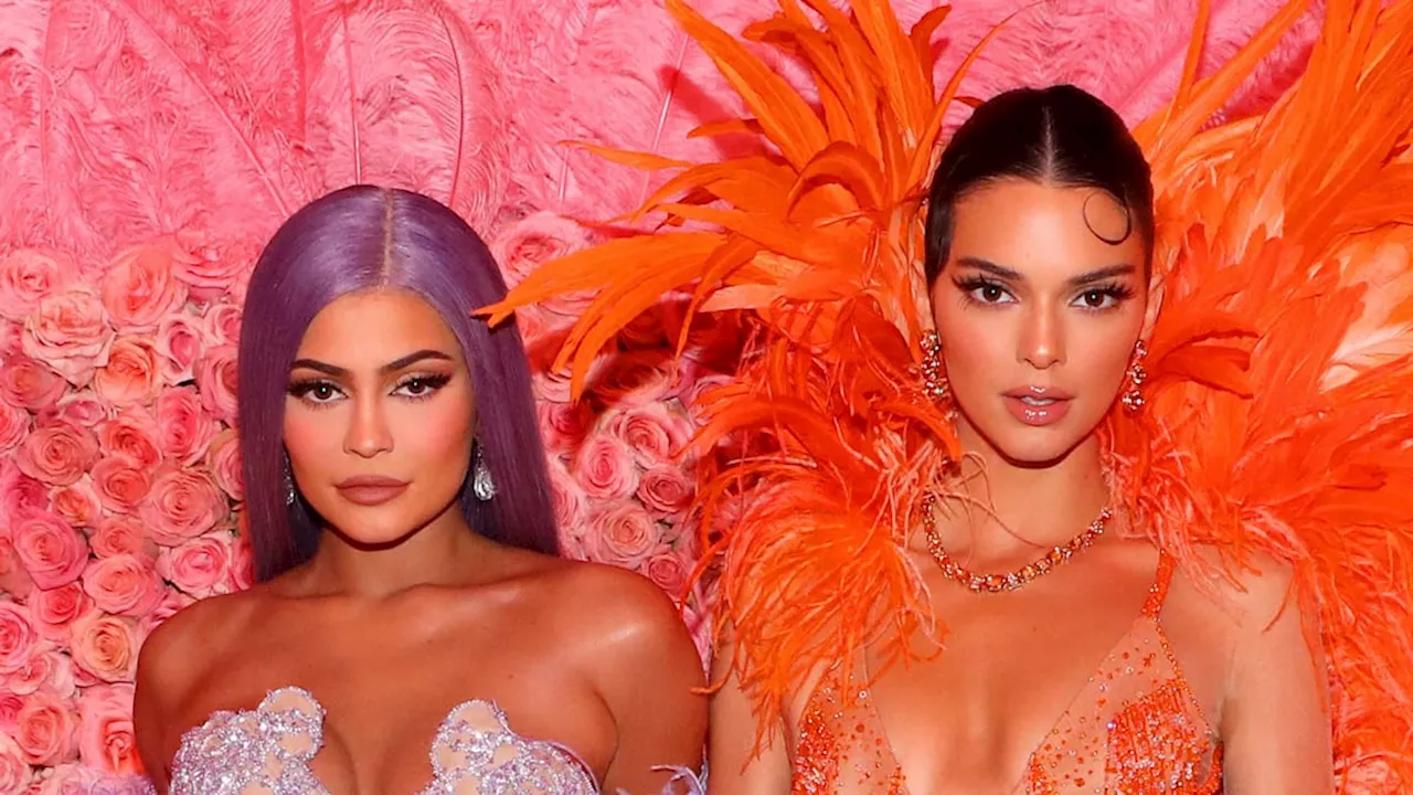 Kylie Jenner and Kendall Jenner are style opposites in daring Halloween corsets