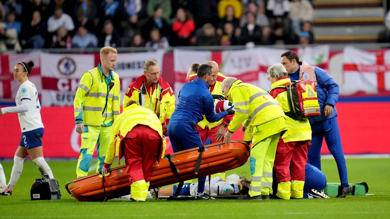 Lionesses' Alex Greenwood 'conscious' after being carried off on stretcher following head clash