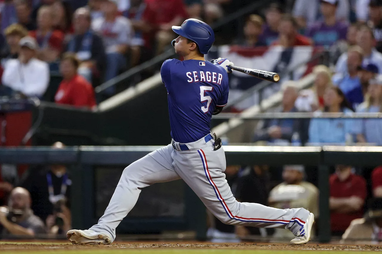 Rangers bounce back to down Diamondbacks, lead World Series