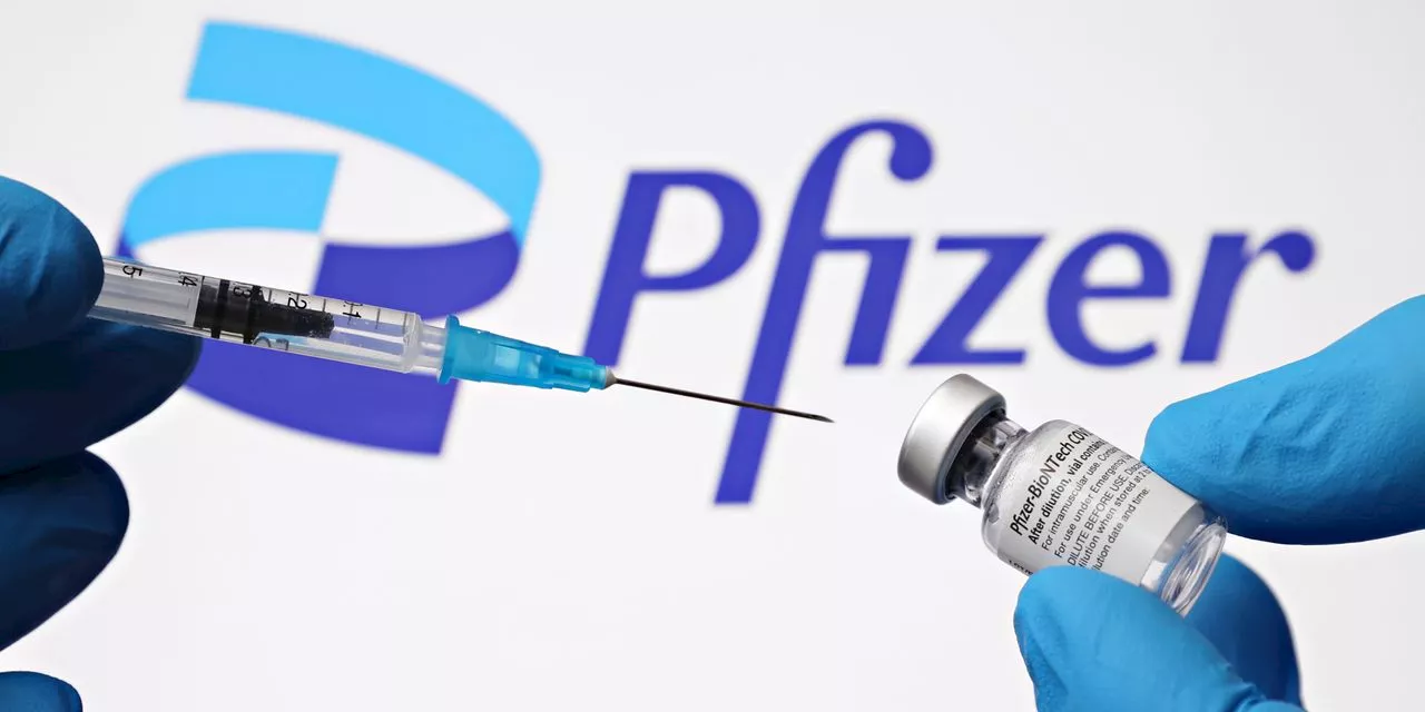 Pfizer swings to wider-than-expected loss but keeps full-year outlook intact