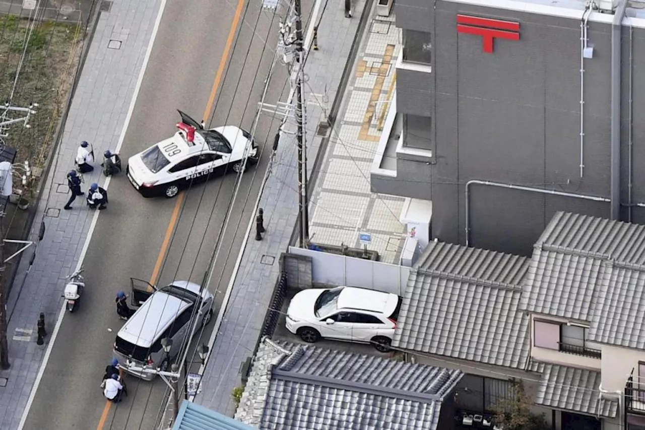 Police in Japan capture suspected gunman after hostage drama at post office