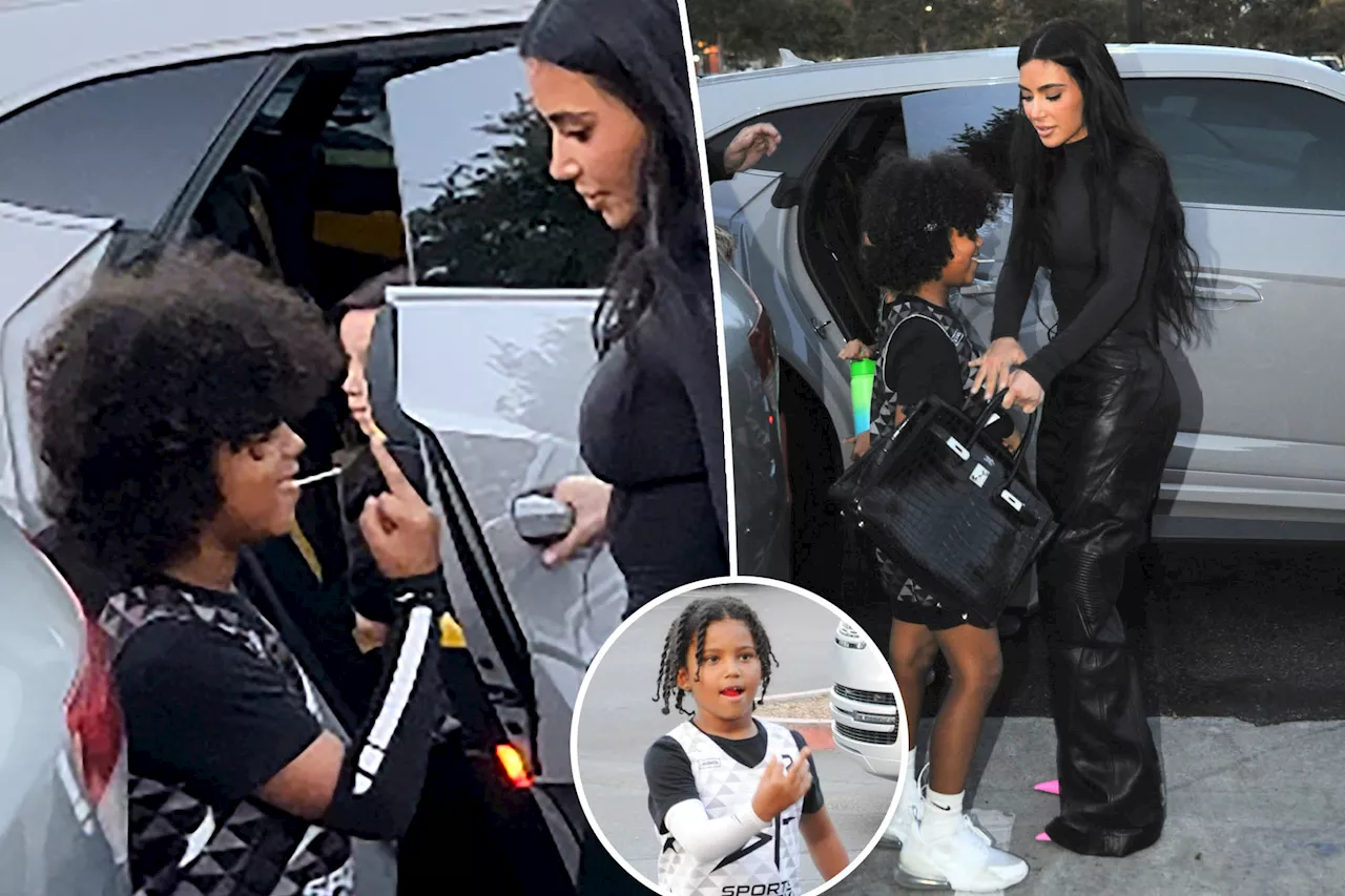 Watch Saint West, 7, flip off the paparazzi and get scolded by Kim Kardashian -- again