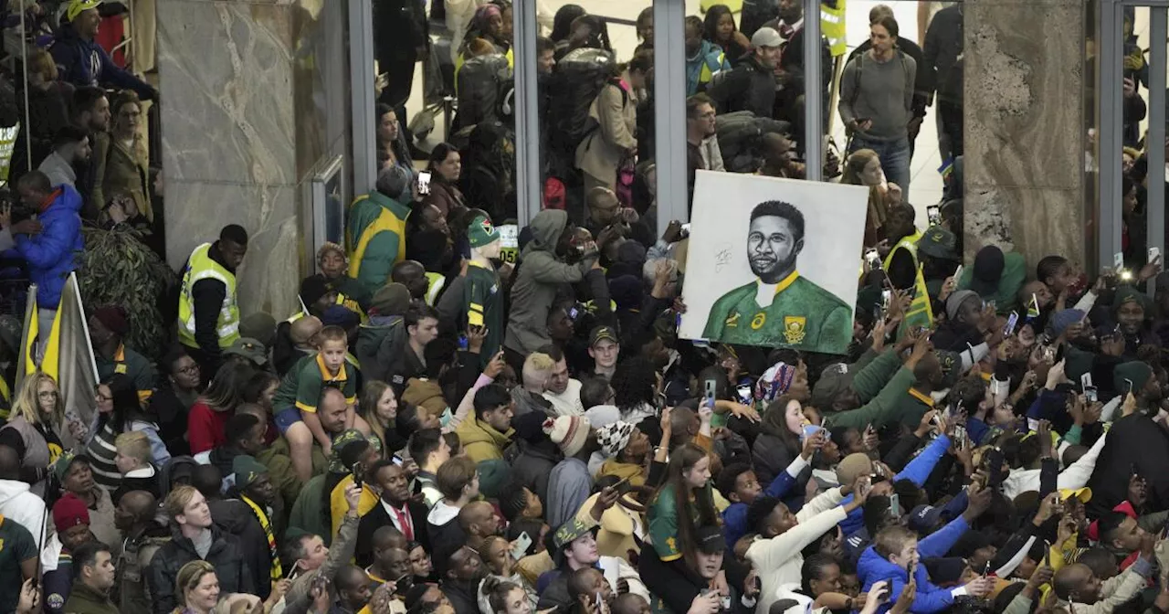 Victorious Springboks arrive back to a heroes' welcome in South Africa