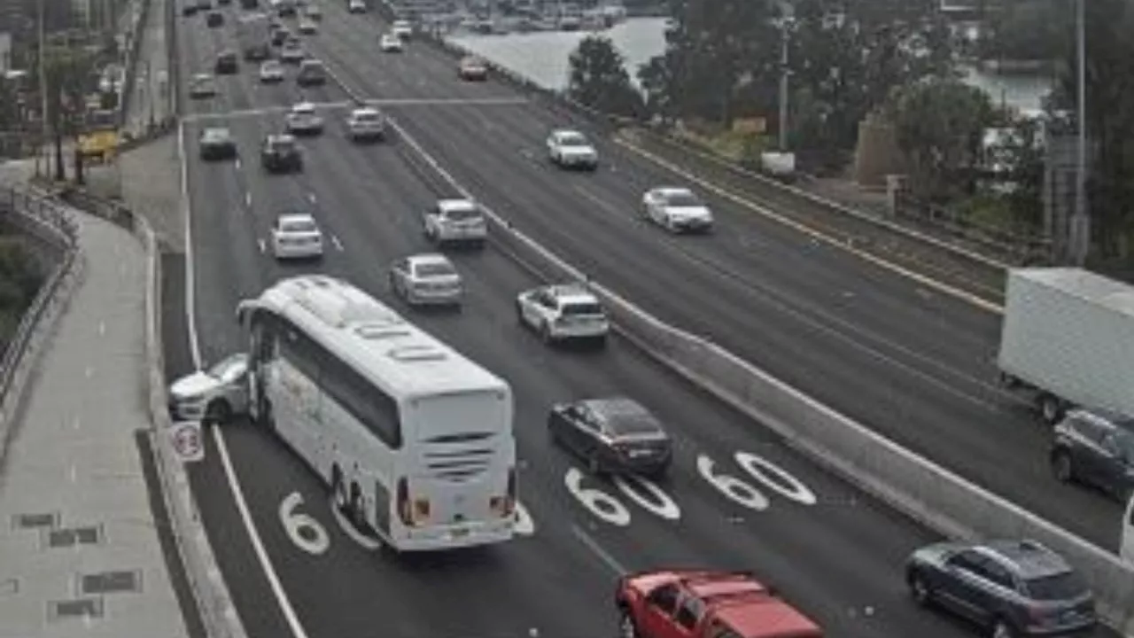 Car crashes with school bus carrying 30 kids on major Sydney road