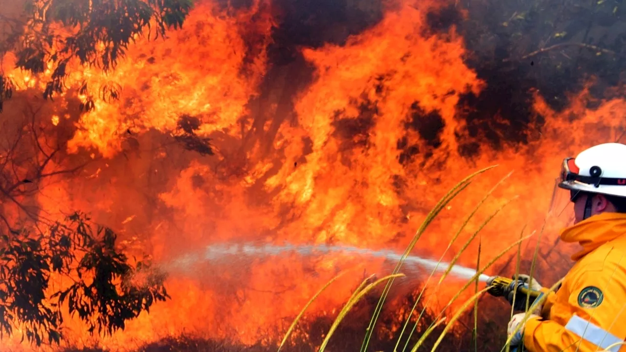 Evacuation order issued as out-of-control blaze threatens homes in Queensland