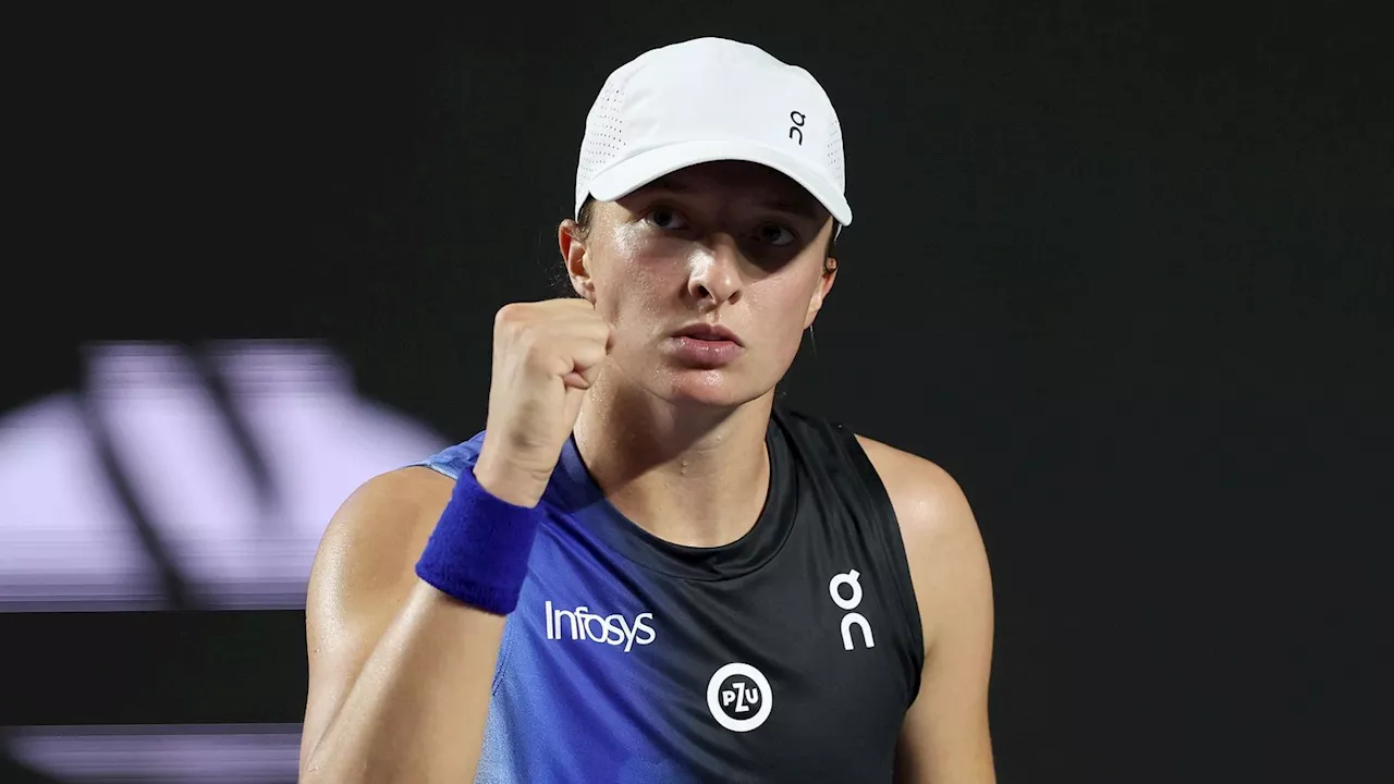 WTA Finals: Iga Swiatek overcomes slow start to beat Wimbledon champion Marketa Vondrousova in Cancun