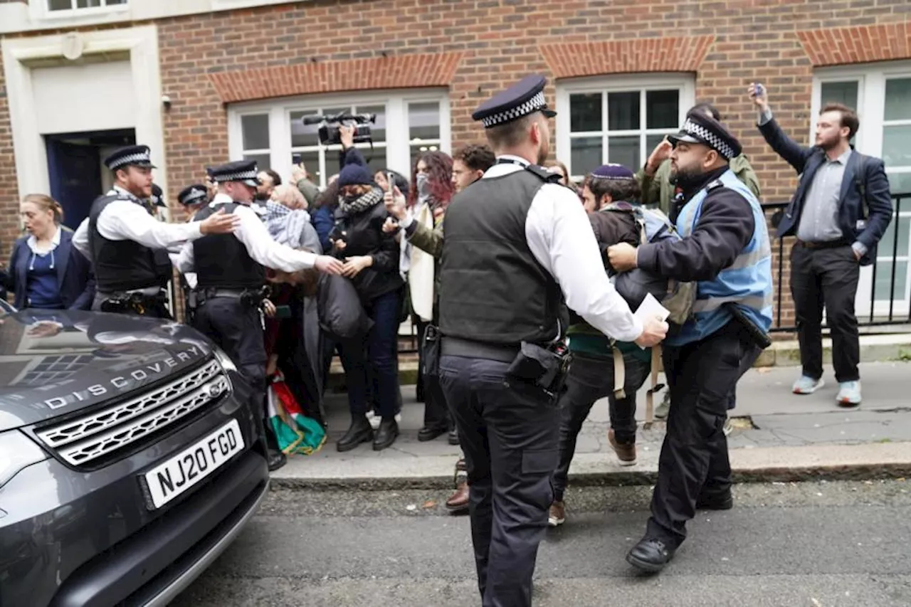 Protesters Clash with Police at London Venue