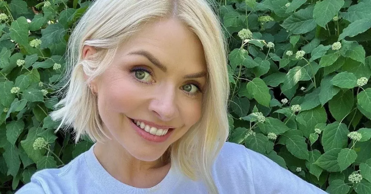 Holly Willoughby sent messages over rare loved-up display after double tragedy