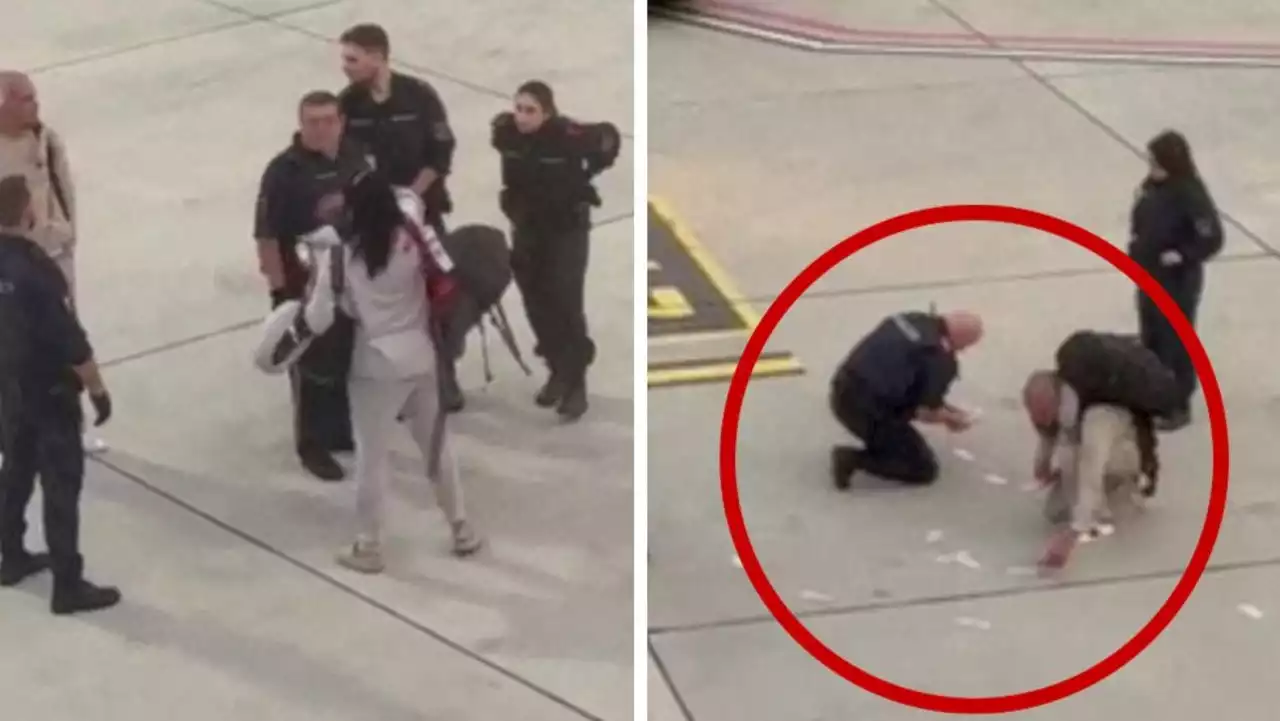 Bizarre moment woman throws $9.5k in cash at man on runway