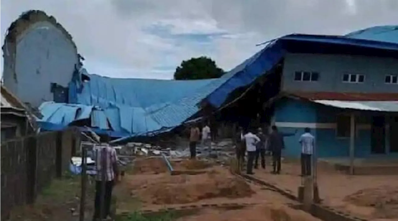 Nigerian pastor visits collapsed church building, mourns pastor