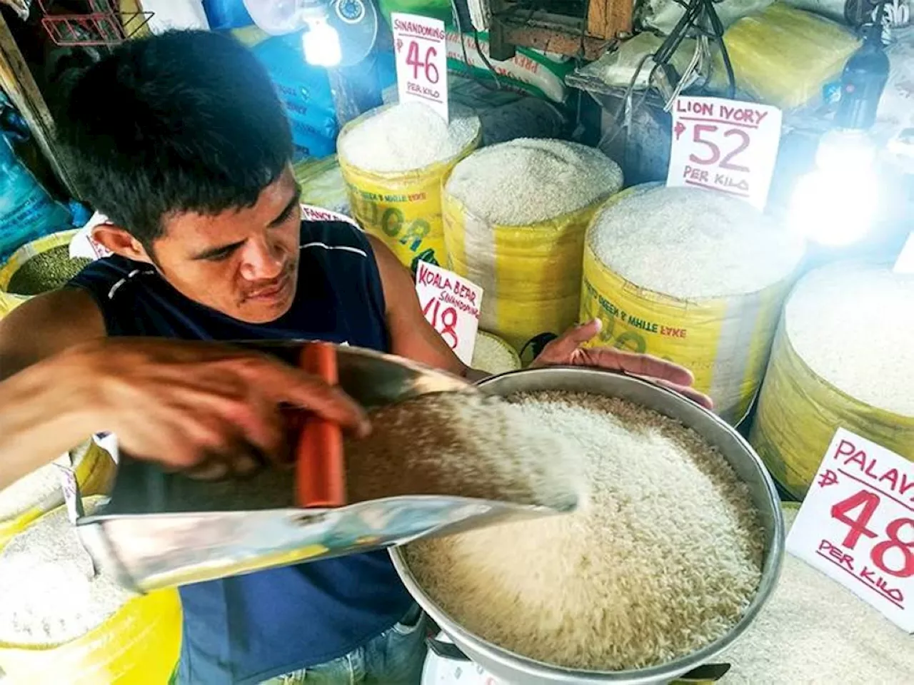 Marcos lifts price cap on rice