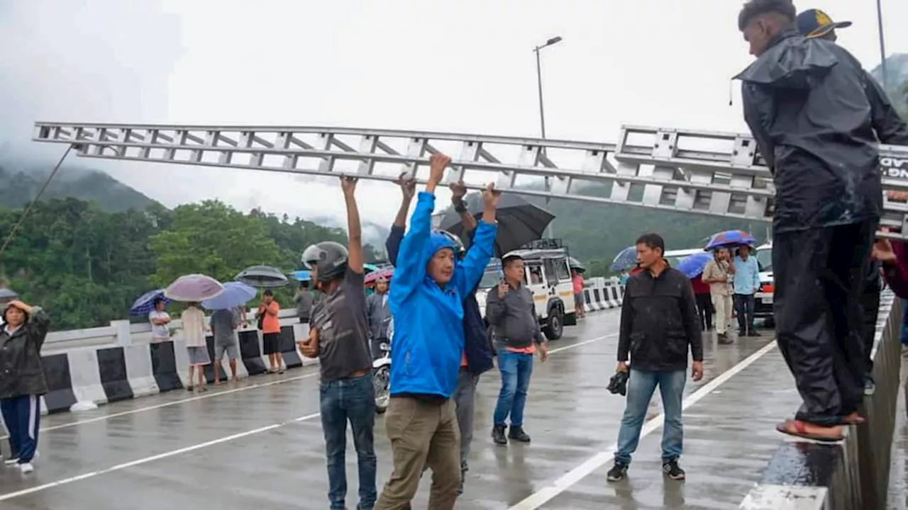 Flash floods kill at least 14 in northeastern India; over 100 missing