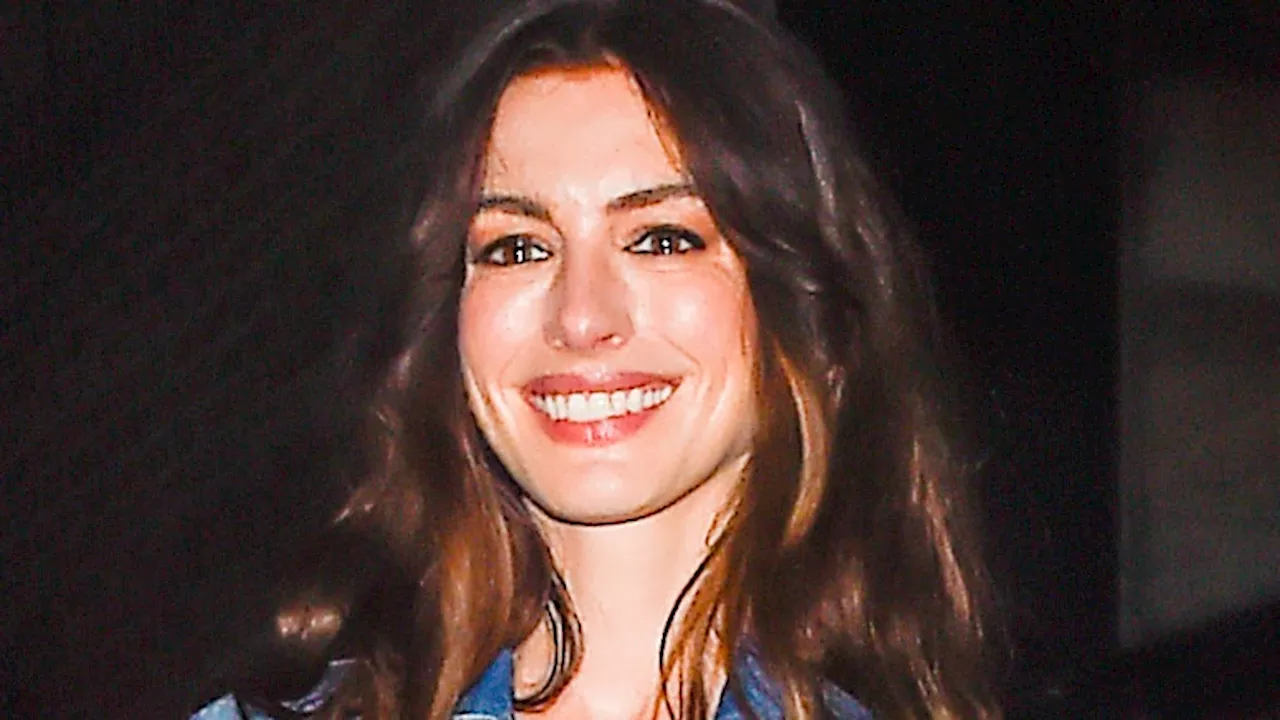 Anne Hathaway Proves a Cropped Denim Jacket Really Does Go With Anything—Even a Red Carpet Gown