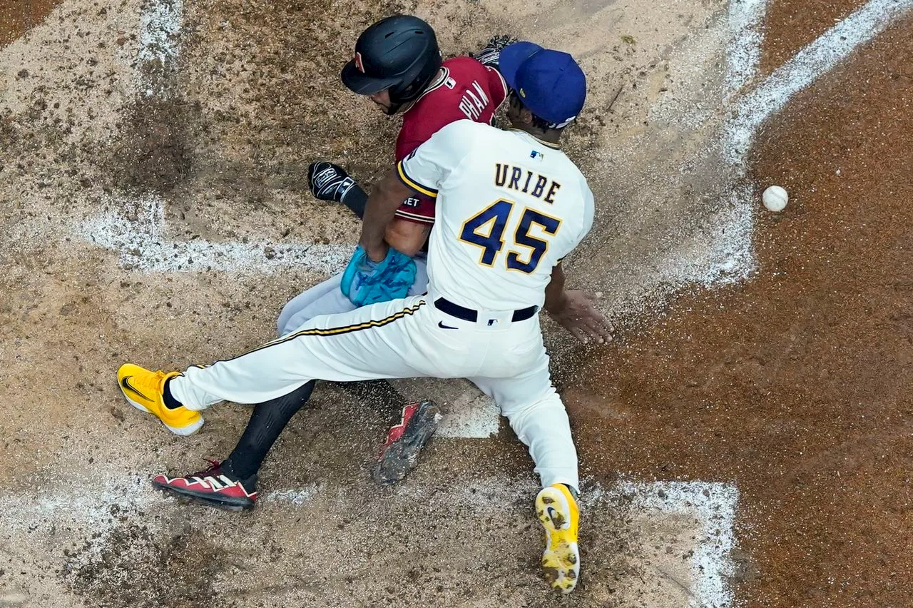 Diamondbacks erase early deficit to beat Brewers, sweep NL Wild Card Series