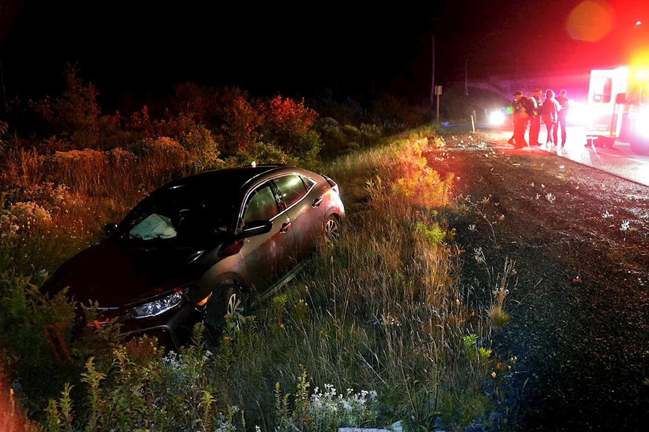 Car collides with microwave thrown from St. John\u0027s overpass late Wednesday night