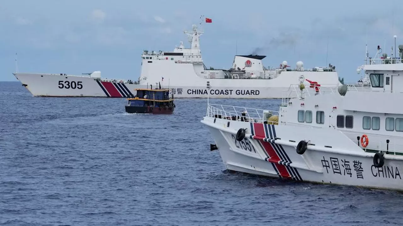 Philippine boats breach Chinese coast guard blockade in another face-off