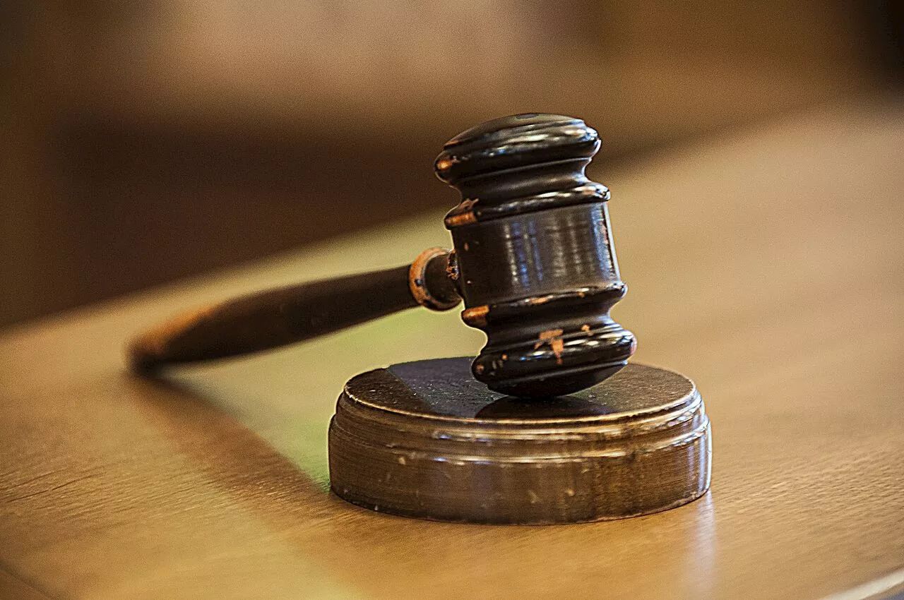 Messenger charged with stabbing brothel manager