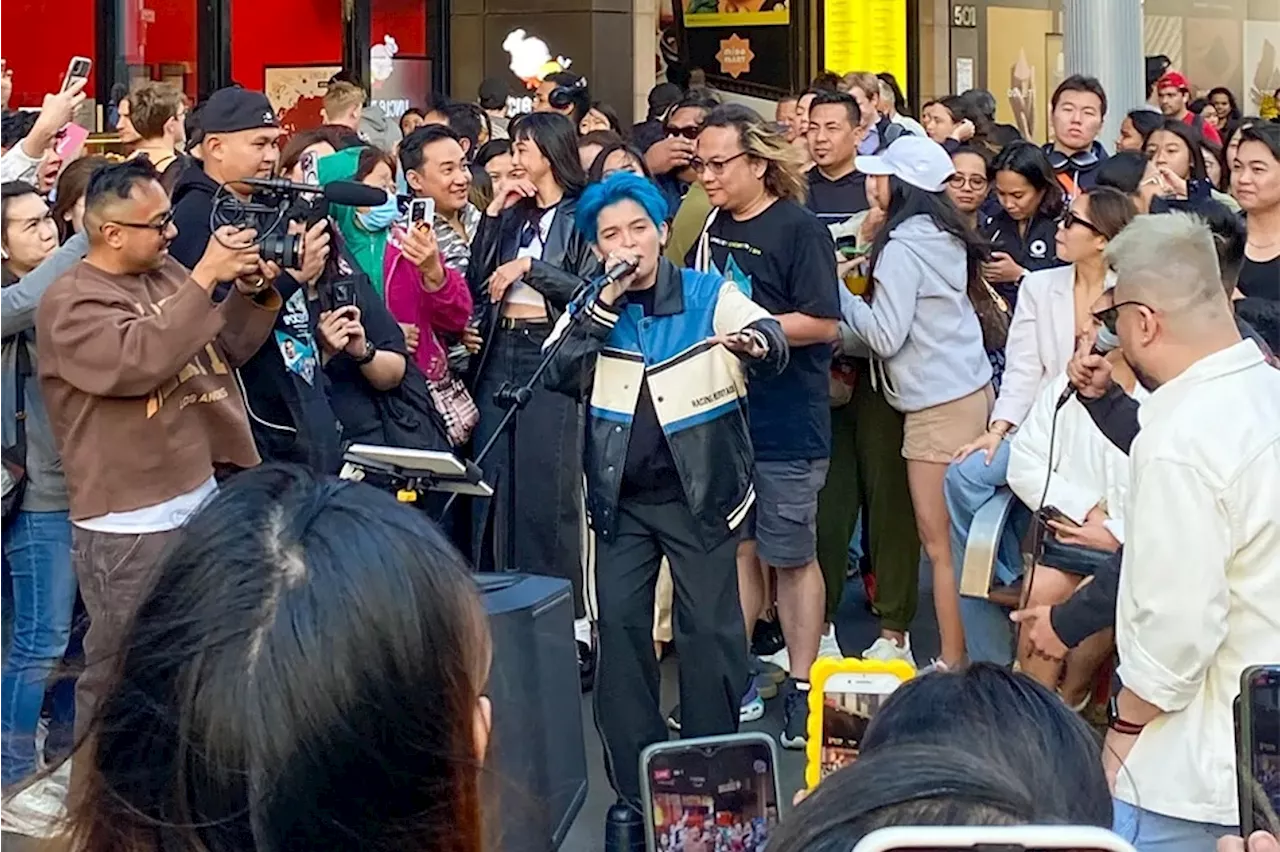 WATCH: KZ Tandingan enjoys busking in Sydney