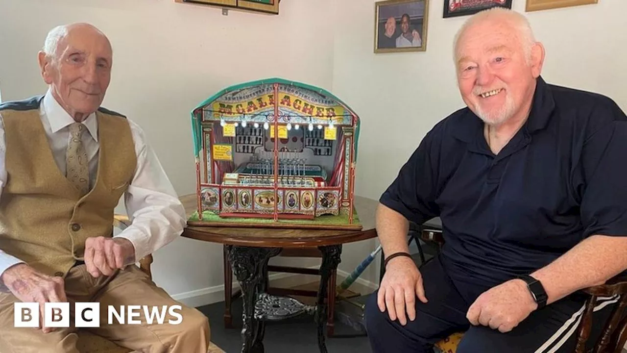 Hull Fair family recreate 1900s rifle range stall