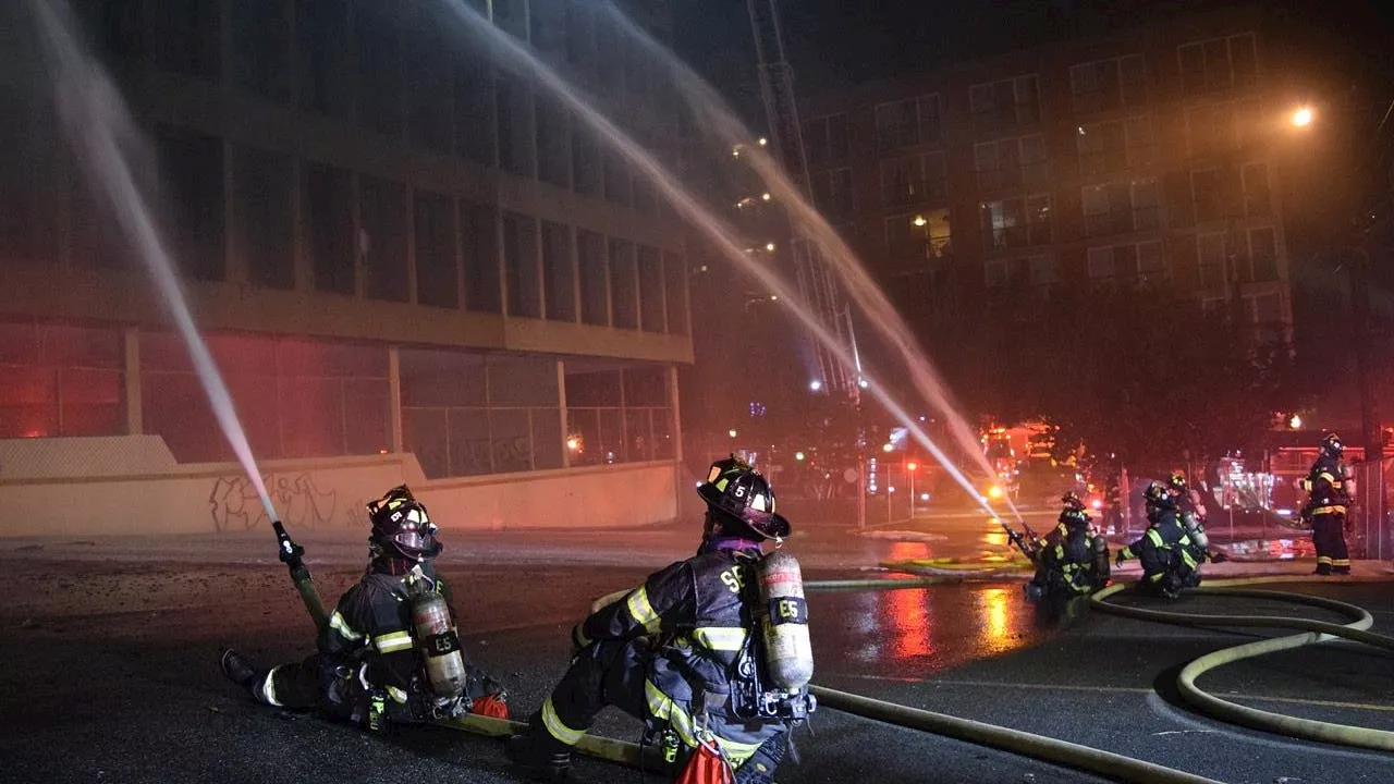 Vacant building in Lower Queen Anne catches fire, Seattle Fire Investigating