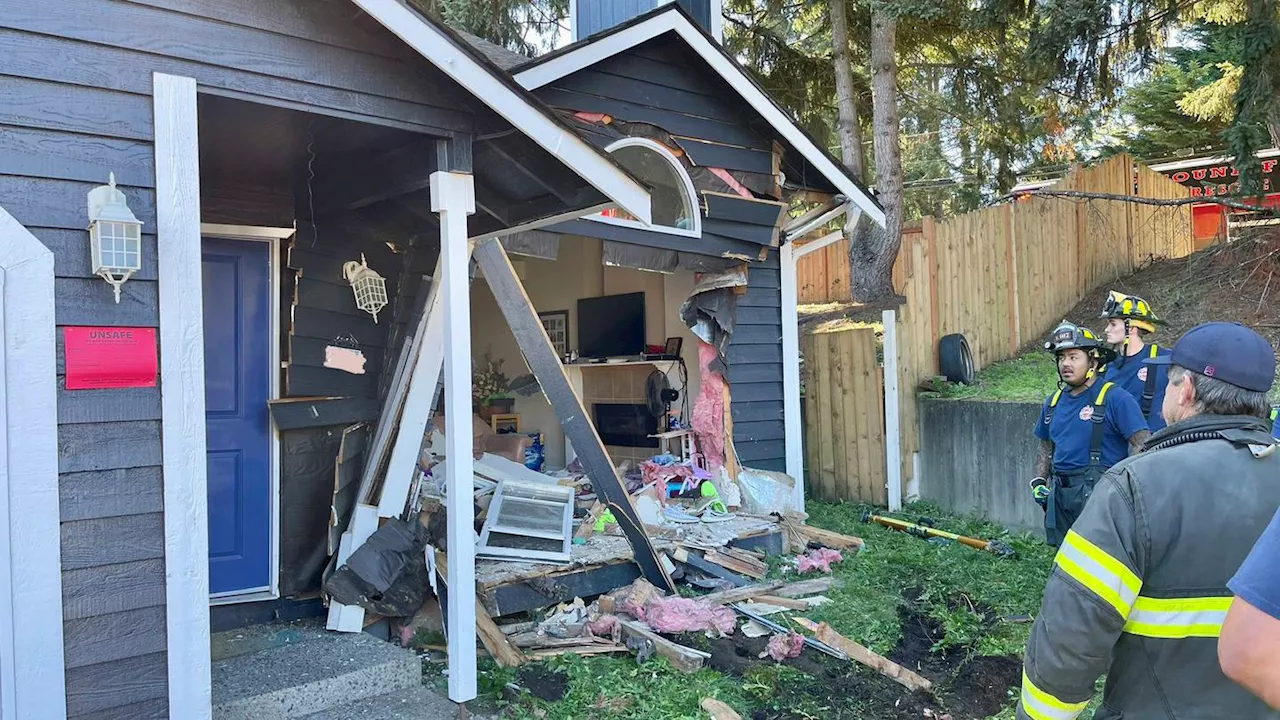 Significant damage after car crashes into Kent home