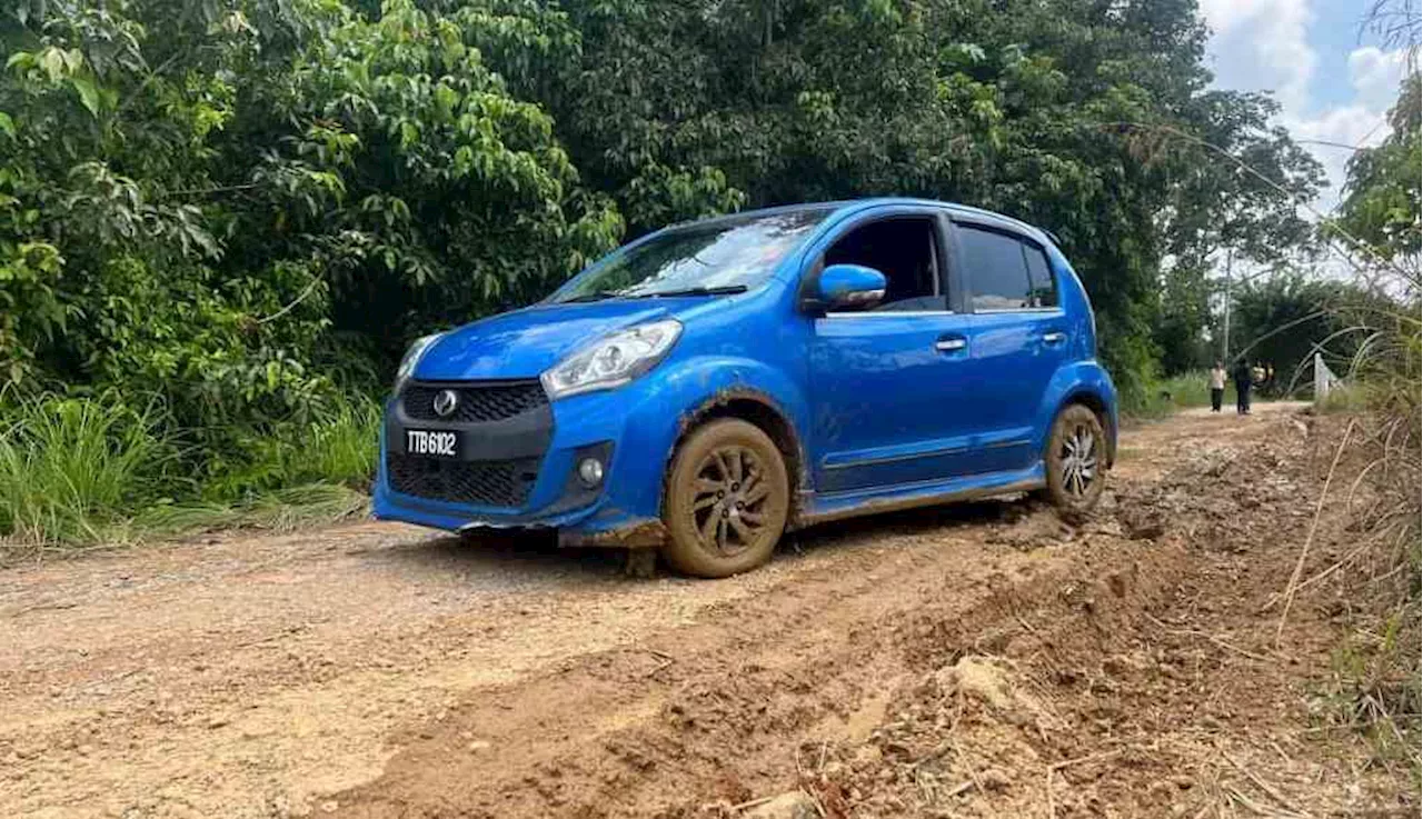 Penduduk guna duit poket sendiri RM10,000 baiki jalan rosak