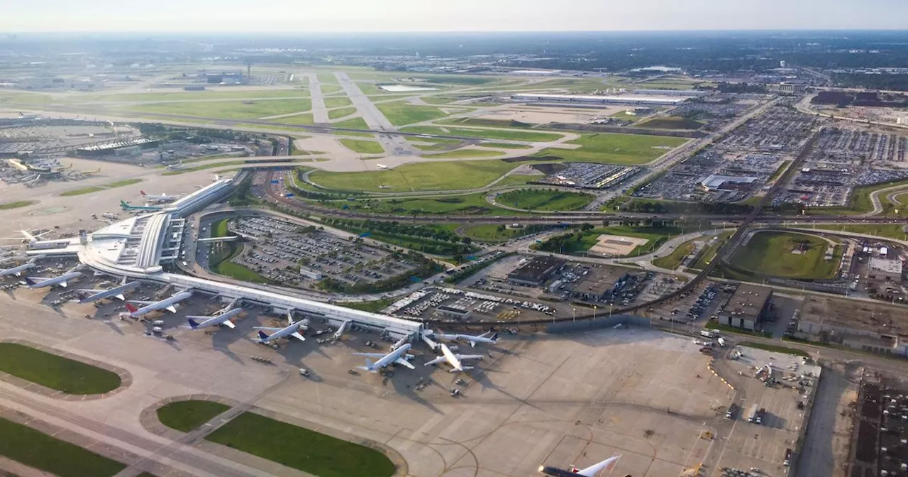 Two injured as taxiing plane collides with Chicago airport shuttle bus