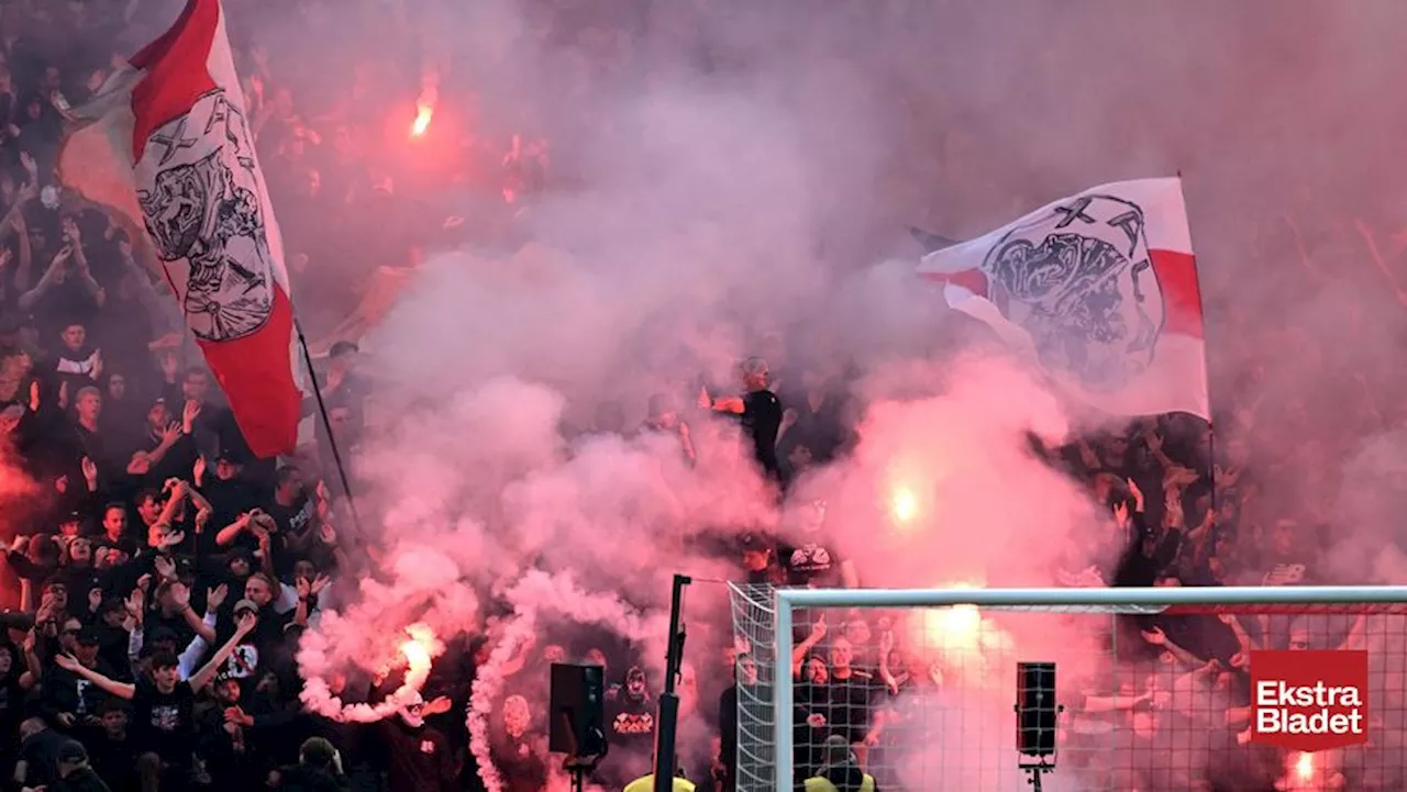 Fem Ajax-fans ryger bag tremmer