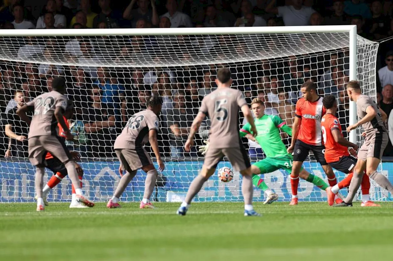 Micky van de Ven scores as 10-man Tottenham go top with win over Luton