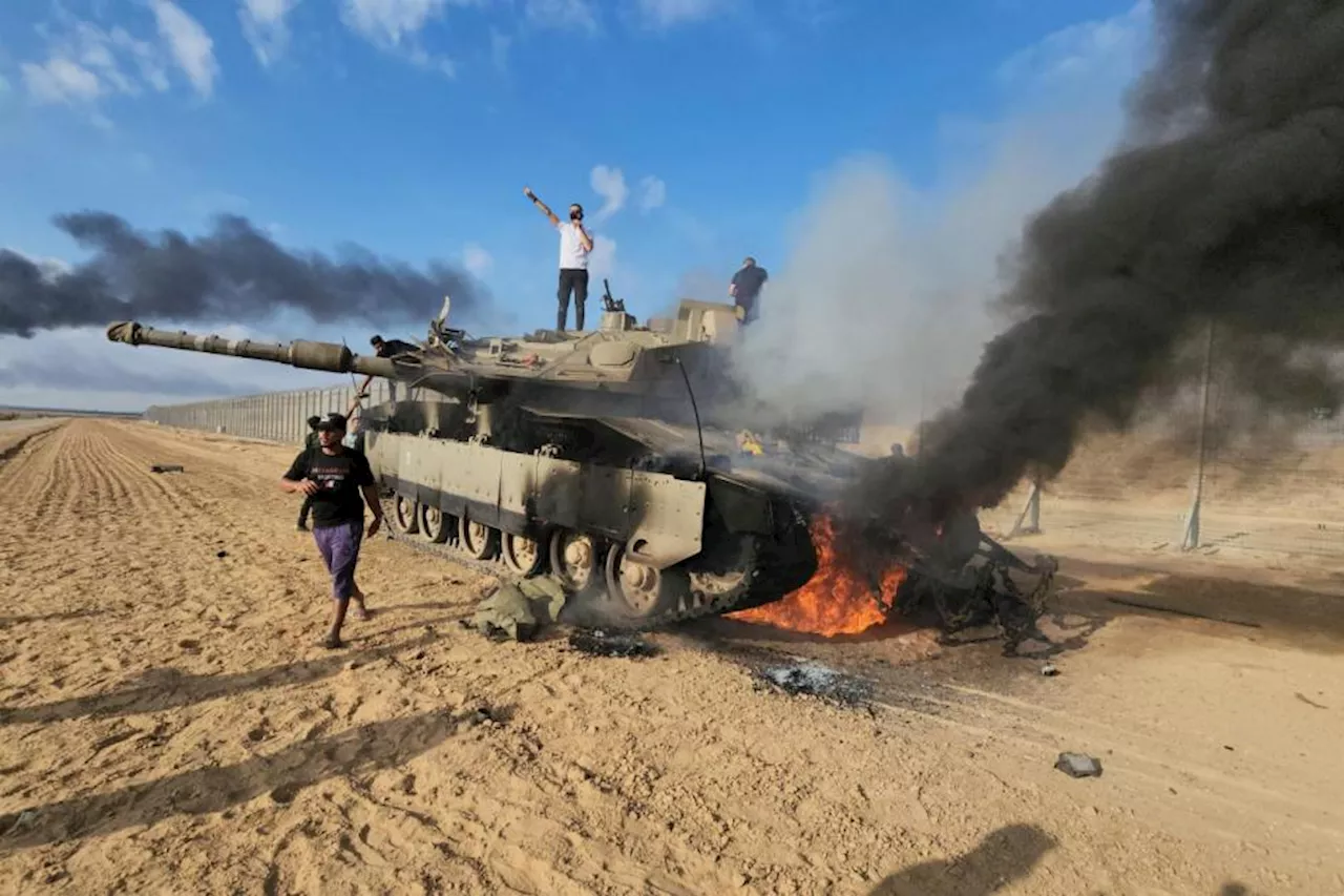 Hamas attack out of Gaza Strip stuns Israel and leaves at least 200 dead