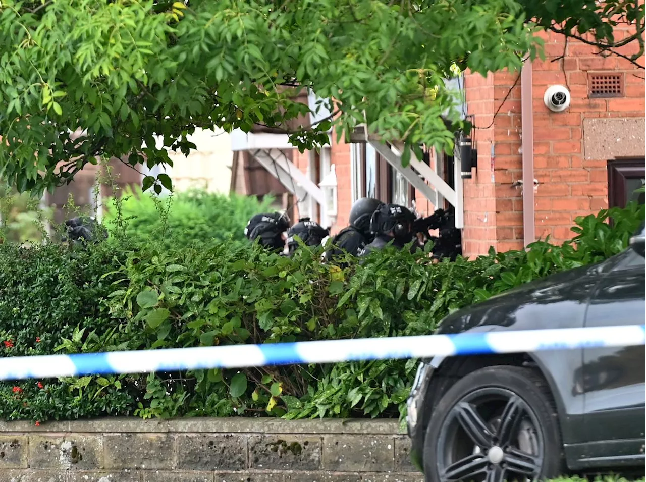 Armed police and negotiators at Wolverhampton property with man barricaded inside