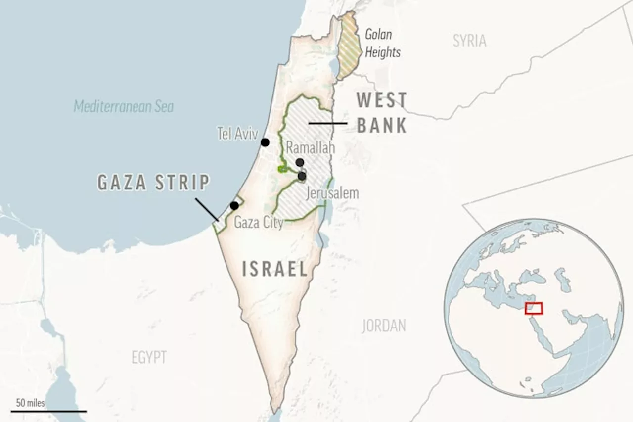 Palestinian militants launch dozens of rockets into Israel. Sirens are heard across the country