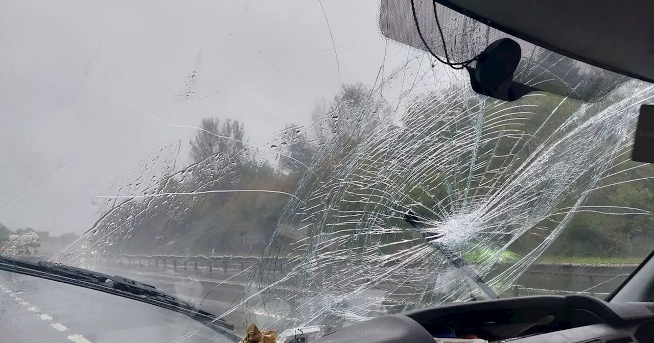 Van with smashed up windscreen and plastic covering door caught on Scots road