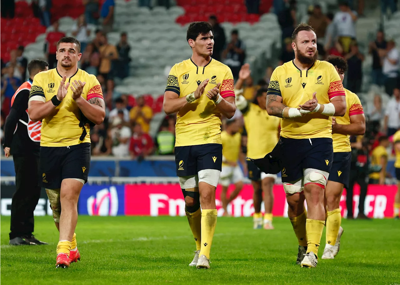 Rugby-Romania show late grit at end of humbling month