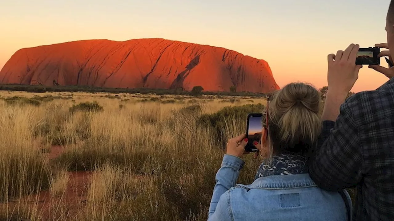 Uluru visitor numbers slump post-COVID in $200 million hit to tourism industry