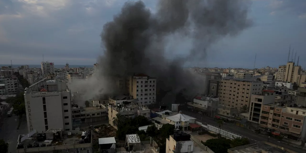 Israel vows complete siege of Gaza as it strikes the Palestinian territory after incursion by Hamas