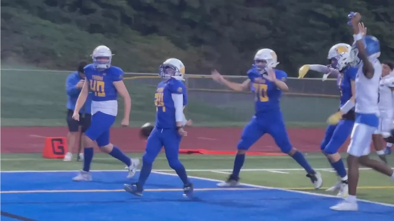 Tahoma High School senior with Down syndrome scores touchdown before homecoming game