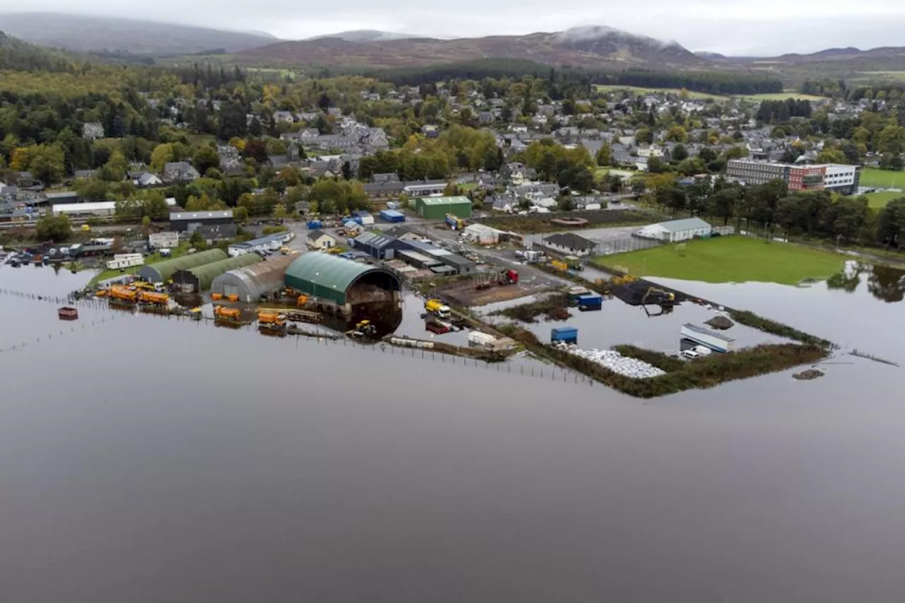 Flood warnings remain in place as rain eases