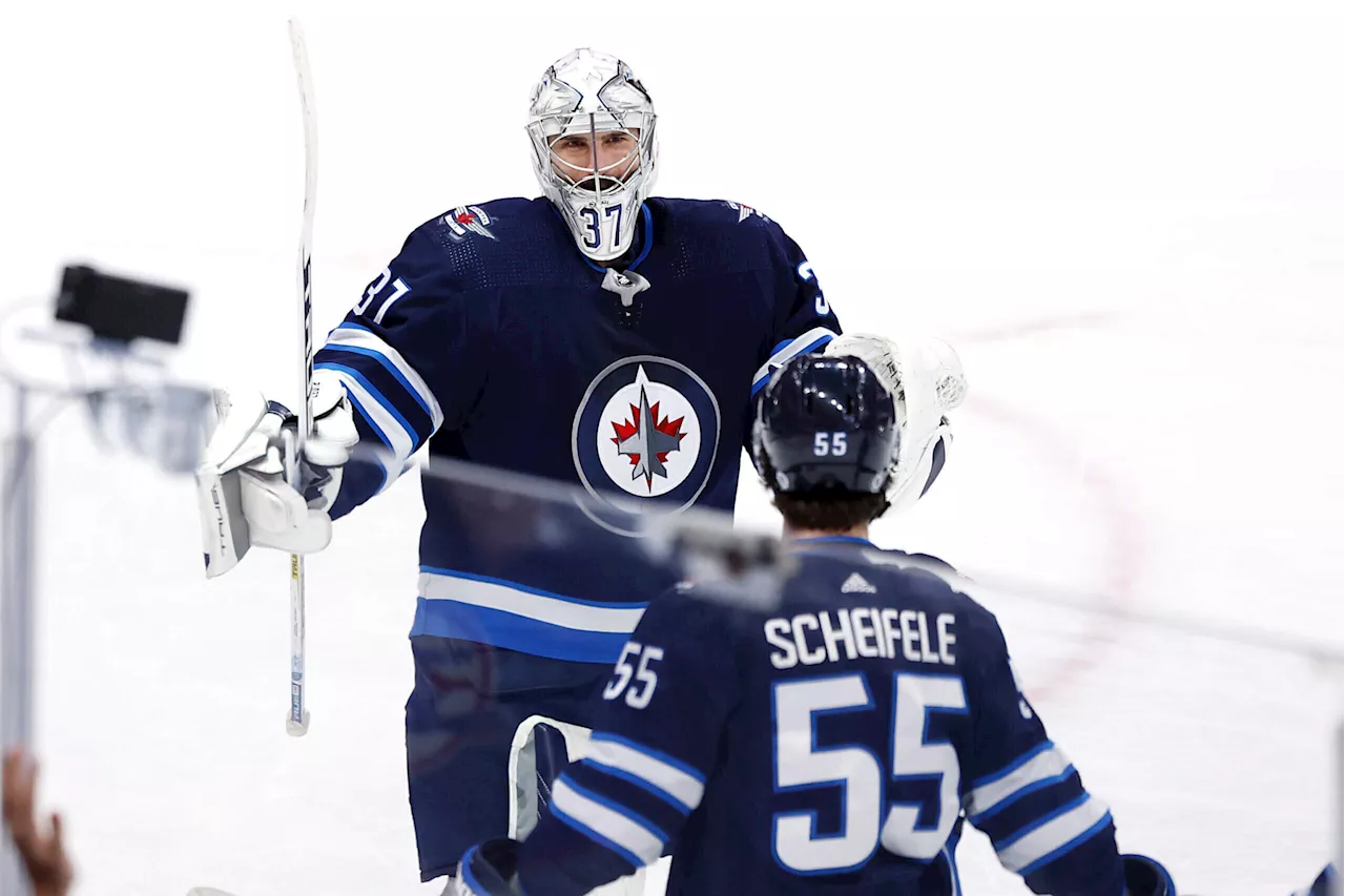 Jets sign Mark Scheifele, Connor Hellebuyck to 7-year extensions with $8.5 million AAV