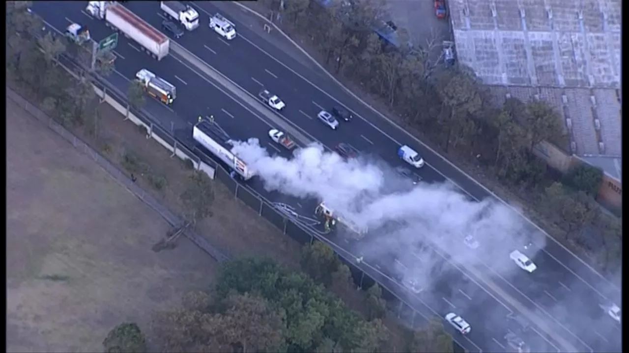 Traffic chaos as garbage truck catches fire on major Sydney motorway