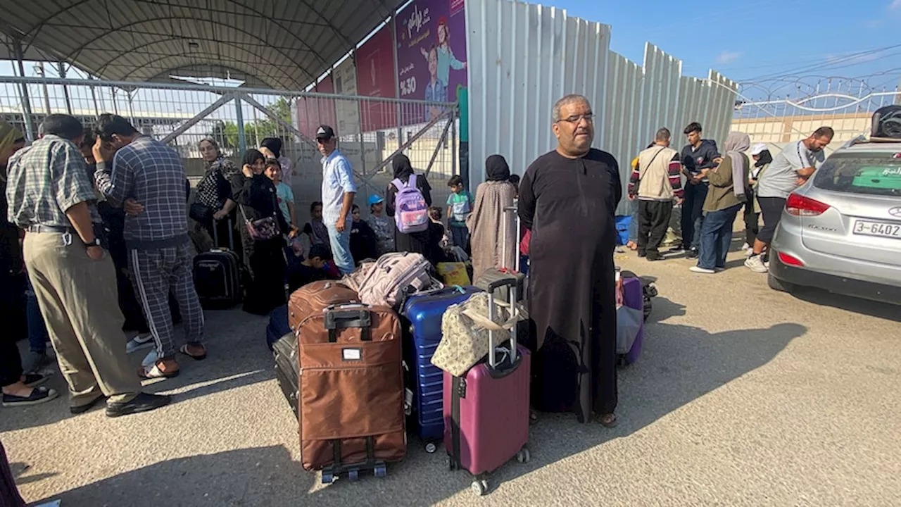 Foreign passport holders enter Gaza as humanitarian aid arrives at Rafah crossing